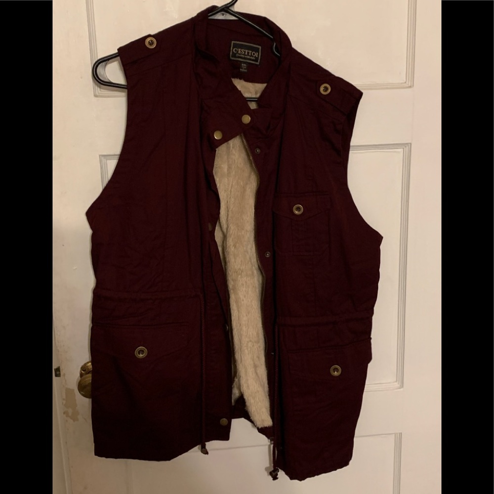 Burgundy vest with tan fur lining